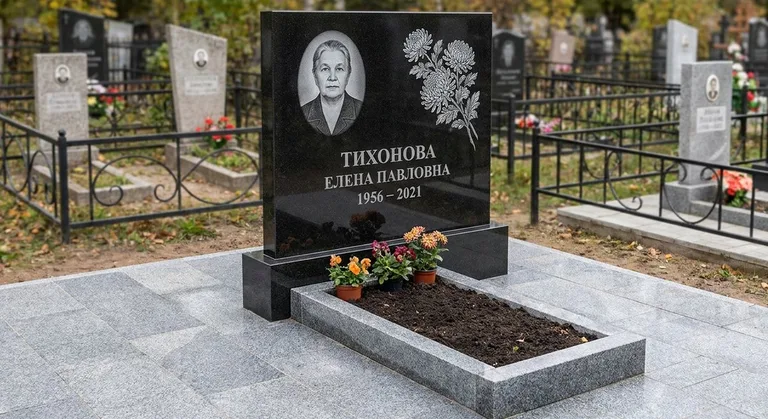 Памятник с гравировкой хризантем — выполненная работа «Тихонова» в Новом Уренгое