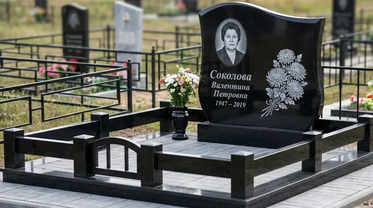 Памятник с гравировкой хризантем — выполненная работа «Соколова» в Новом Уренгое