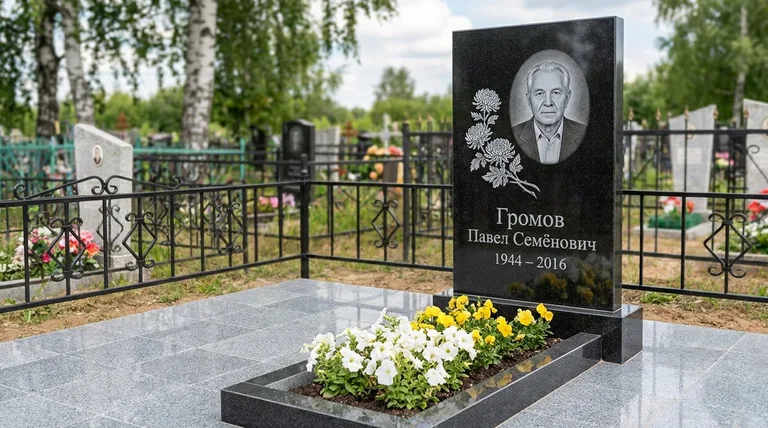 Памятник с гравировкой хризантем — выполненная работа «Громов» в Новом Уренгое