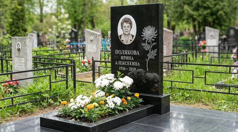 Памятник с гравировкой хризантем — выполненная работа «Полякова» в Новом Уренгое