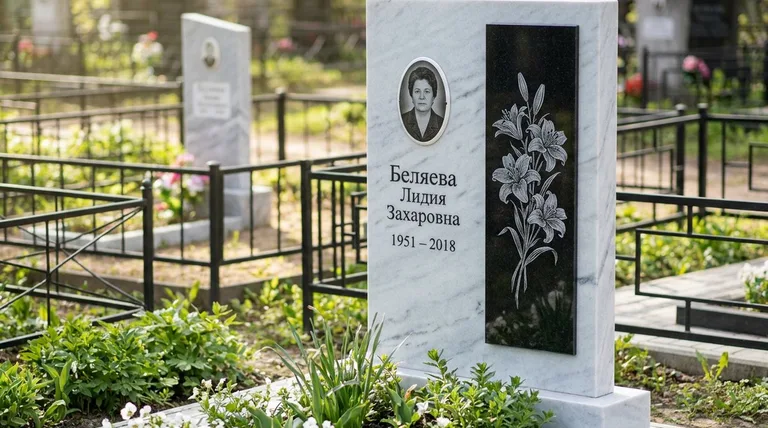 Памятник с гравировкой лилий — выполненная работа «Беляева» в Новом Уренгое