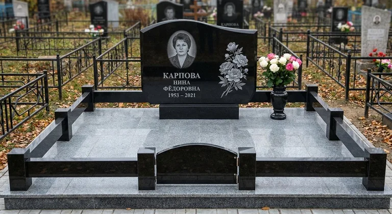 Памятник с гравировкой пионов — выполненная работа «Карпова» в Новом Уренгое