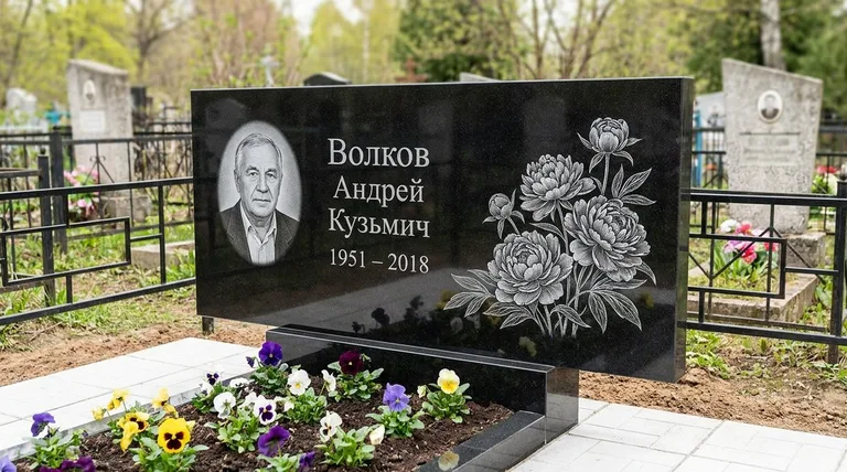 Памятник с гравировкой пионов — выполненная работа «Волков» в Новом Уренгое