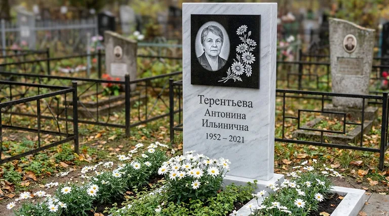 Памятник с гравировкой ромашек — выполненная работа «Терентьева» в Новом Уренгое