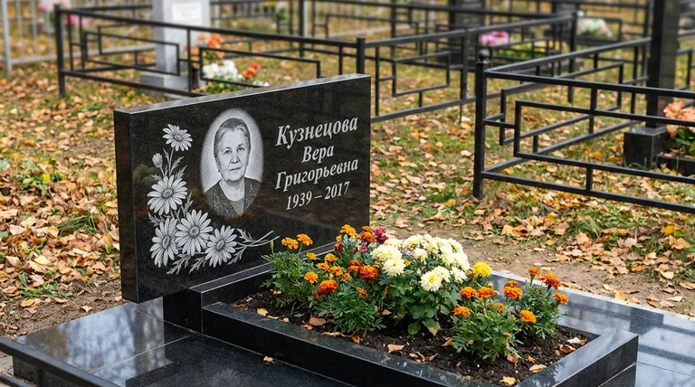 Памятник с гравировкой ромашек — выполненная работа «Кузнецова» в Новом Уренгое