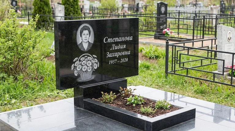 Памятник с гравировкой ромашек — выполненная работа «Степанова» в Новом Уренгое