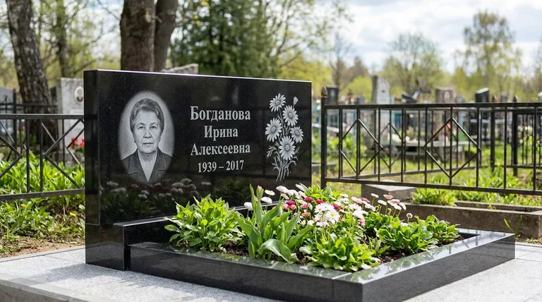 Памятник с гравировкой ромашек — выполненная работа «Богданова» в Новом Уренгое