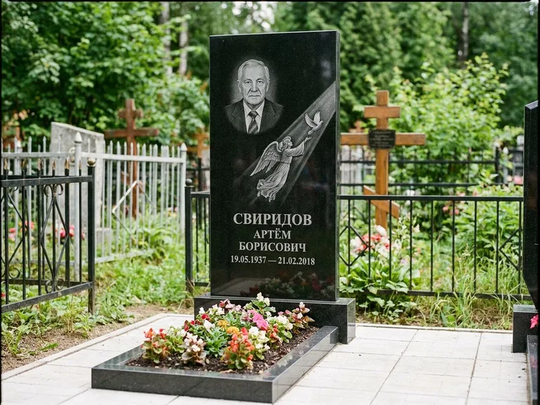Памятник с гравировкой ангела — гравировка ангела с голубем по диагонали стелы, работа «Свиридов» в Новом Уренгое