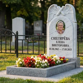 Памятник с парящими крыльями из белого мрамора